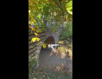 Man holding onto rope does acrobatic spins