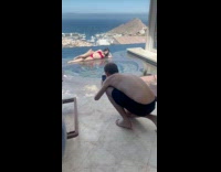 Collab IITW - Woman in red bikini lie down sideways by the mini pool