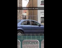 Man playing cowbell instrument inside car 