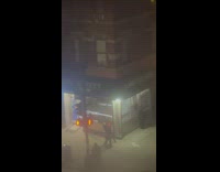 Two Guys Try to Fight at Night on Sidewalk 