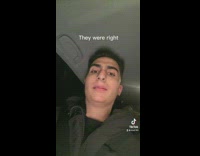 Bearded Man Turns Face Around inside Car