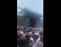 Man scream startled by peekaboo at concert