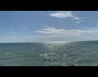 C-130 plane fly towards shore make turn