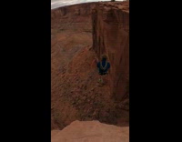 Guy bungee jumps off canyon