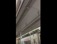 Broken intercom on the subway train makes voice sound distorted 
