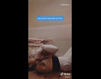 Girl does workout bag of rice