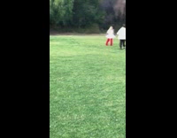 Woman red pants white skirt tumble park Part 2