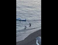 Woman in beach dress hair flip and outbalanced