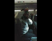 Guy shotguns beer while riding in airplane 