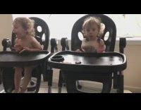 Twin babies scream in booster seats