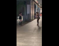 Two women in dress photoshoot at mall