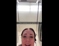 Woman asked about credit card inside bathroom stall 