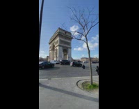Man sit on the road arch in Paris