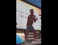 Man boxers dance over car times square