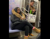 Men with Same Fashion Outfit Rides Train