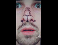 Guy makes girl drawn on nose dance 