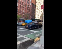 Guy Carries Bunch of Balloons on Street 