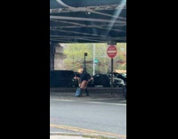 Woman wears bodysuit twerks on the street