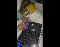 DJ guy blasts music while girl sleeps 