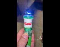 Custom taser inside of green magnesium bottle 