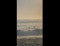 Man prevents phone from water but gets wet by huge wave