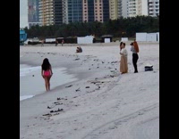 Collab IITW - Woman pink bikini beach walk for video