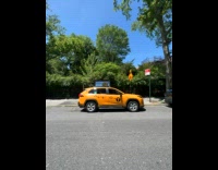 Collab WINY - Empty Taxi Car on Street Sidewalk Bounces