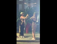 Kid girl take picture woman street night