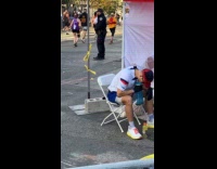 Man pukes at the Marathon Medical Station