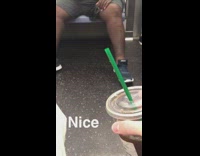  guy in red shirt and grey pants pees on subway train 