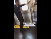 Guy practices martial arts moves train subway 