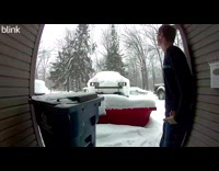 Guy walks back to house hits icicle
