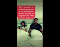 Couple in bed guy stares into space 