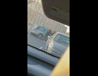 Girls dance in parking lot