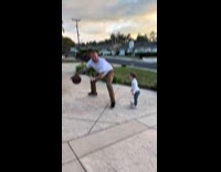 Man pretends to be blocked by toddler playing basketball 