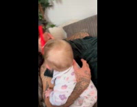 Baby hits dads forehead with toy hammer 