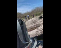 Two girls small jump shot rocks bag