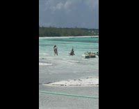 Guy black brief pose on table beach part 1