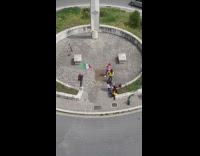 Man waves the flag of Mexico at the park