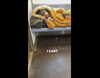 Guy napping with his dog in jacket on subway