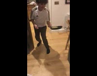 Dog hump leg while kid flip pancake