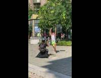 White shirt lady holds rectangular mirror stand