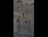 Woman bikini lie down sideways photo shoot beach