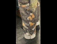 Man has pictures of cigarette butts on pants