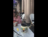 Girls fix hair for selfie marble table 