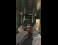 Two guys in metal sheet vent red helmet 