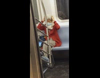 Old woman on subway train trying to relax going home
