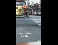 Guy rides bike with pot on his head