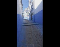 Town in Morocco surroundings is painted blue