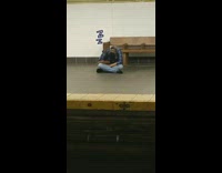 blue flannel subway station sitting face down